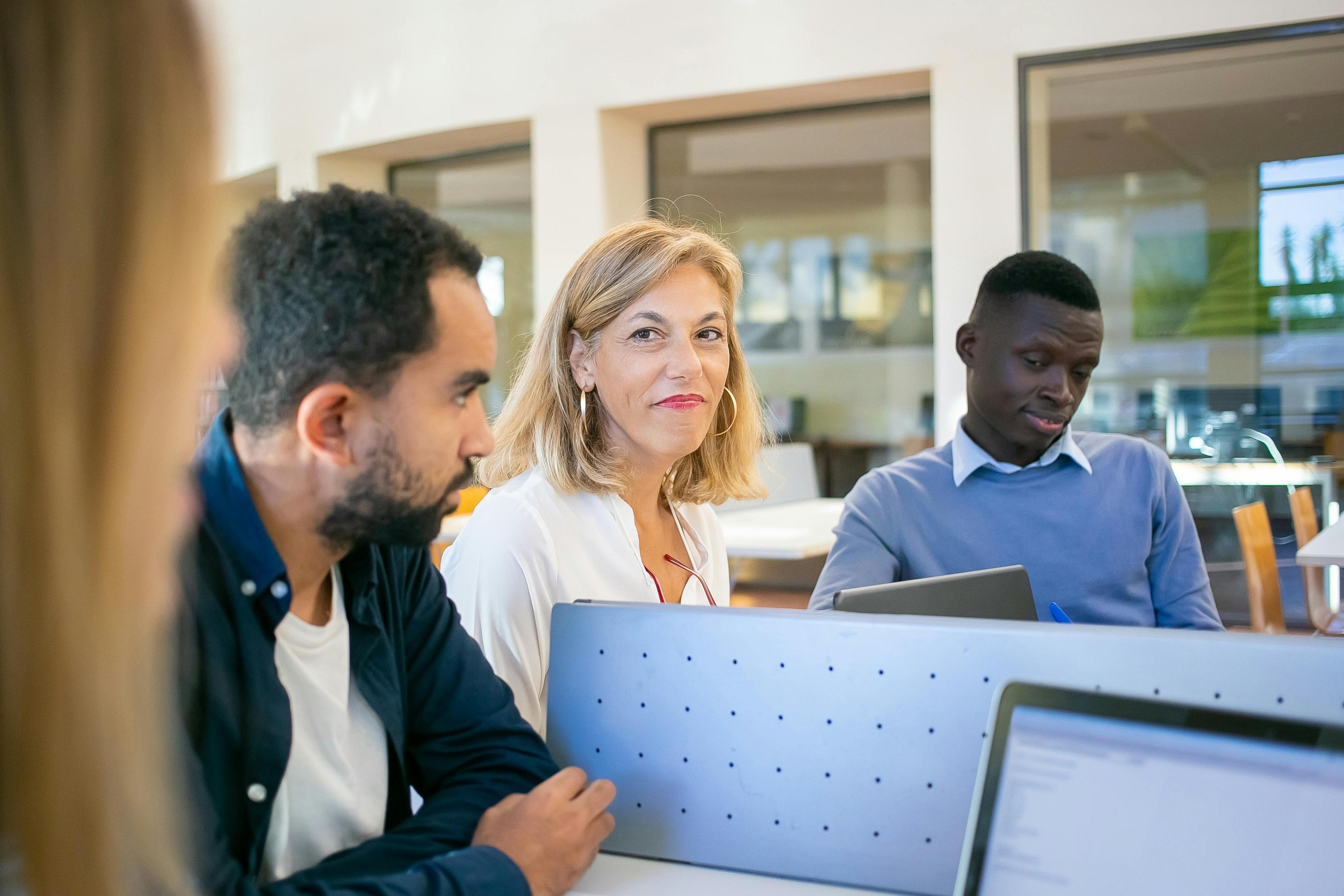 Learner receiving guidance from an advisor before choosing a study route